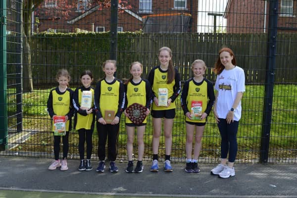 Pupils from Kings Park Primary School, Lurgan, with Athletics NI Ambassador, Hannah Gilliland