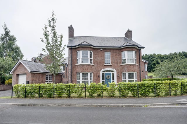 The property boasts a tarmac driveway providing private off-road parking, along with a separate garage for additional storage or vehicle space.