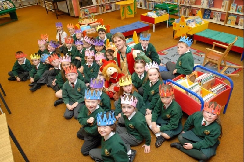 St MacNissi's Primary School pupils pictured with Jingles and Mr Hullabaloo after the Hullabaloo Interactive Theatre at Larne Library in 2007.