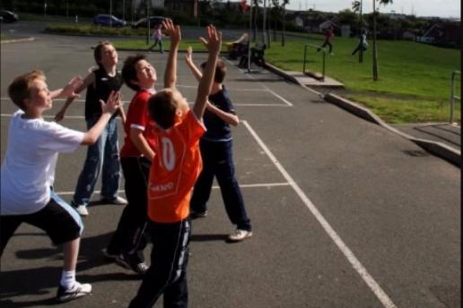Playing basketball during the Carrickfergus summer scheme at Ulidia.