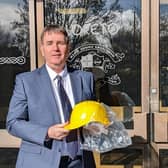 Stephen Gallagher, Principal of Loreto College, Coleraine, taking delivery of his new hard hat in preparation for the recommencement of the Capital Build Project at the
school announced by the Minister of Education. Credit Loreto College