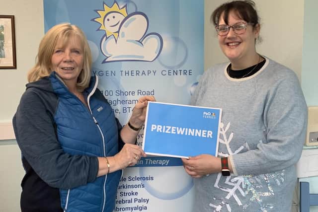 Linda Boyd, OTC, presenting Joanna Bingham with the P&O voucher. Photo submitted by Oxygen Therapy Centre.