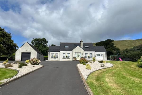 The home is situated on an elevated site with panoramic views.