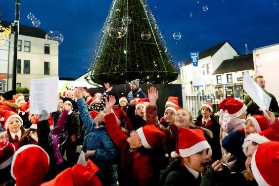 Children pictured enjoying the Christmas switch-on event in Ballyclare.