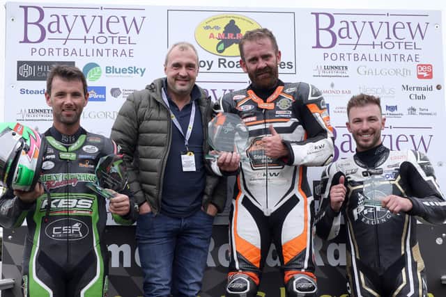 One of the most hotly contested races in 2022 was the Supertwins - pictured on the podium with the sponsors’ backdrop are riders Jamie Coward, Michael Sweeney (who is currently injured but trying to return to riding for Armoy) and Paul Jordan, alongside last year’s sponsor Colin Johnston of Galgorm Collection.
Photo: Stephen Davison Pacemaker Press