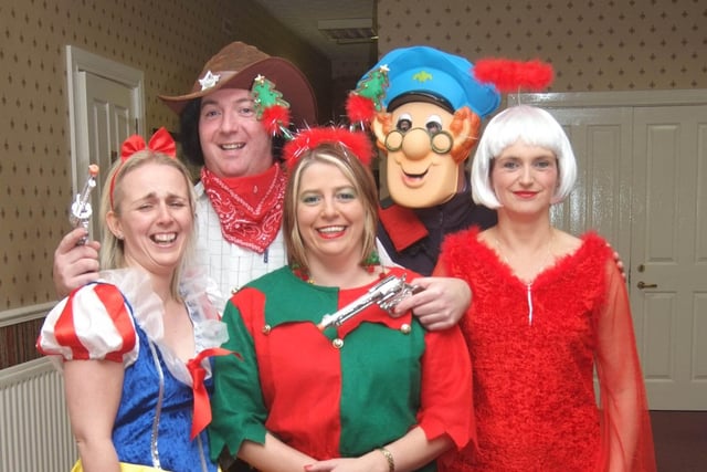 PROUD AS PEACOCKS...Shelley Molloy, Trevor McGonigle, Rhonda Connor, Neill Lees and Denise McGonigle join in the party at the the Bertie Peacocks Youth Fancy Dress fundraiser in the  Montra Club, Coleraine, in 2009.