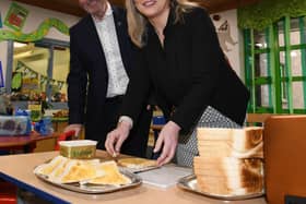 Michelle O’Neill pictured making toast with Sean Dillon, headmaster at Primate Dixon Primary School, during her visit to her former primary school. Credit: Submitted