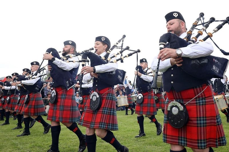 The grounds were filled with the sound of pipes and drums.