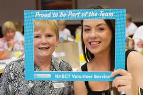 Phyllis Tweed and Maria McKernan, who volunteer with the bereavement comfort call service, pictured at an event held for volunteers in the Northern Health and Social Care Trust. CREDIT NHSCT