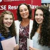 Pictured on GCSE results day 2018 at Ballyclare High School are Erin McWilliam and Zoe Black, with principal Dr Michelle Rainey.  Both topped the scores in Ballyclare with 10A* and 1A.   Photo: Freddie Parkinson