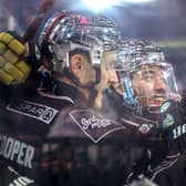 Belfast Giants’ Mark Cooper and Elijiah Barriga celebrate a goal against the Cardiff Devils during in the Challenge Cup final at the SSE Arena, Belfast. Photo by William Cherry/Presseye