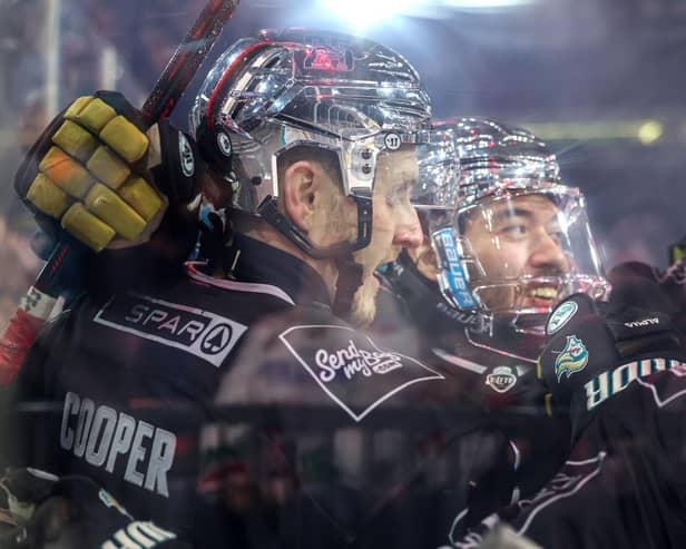 Belfast Giants’ Mark Cooper and Elijiah Barriga celebrate a goal against the Cardiff Devils during in the Challenge Cup final at the SSE Arena, Belfast. Photo by William Cherry/Presseye