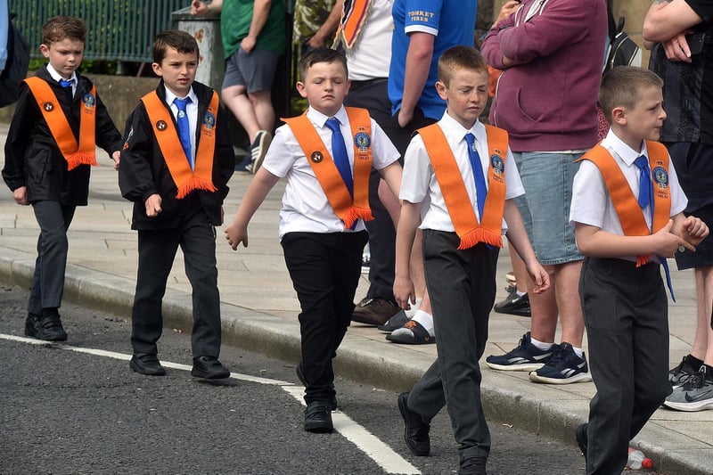 Young Portadown Junior LOL lads concentrating hard as they parade through the town centre before setting off for Bangor. PT22-232.