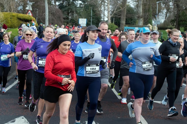Participants in the 10K race looking intent as they begin their run on Sunday morning. PT13-219.
