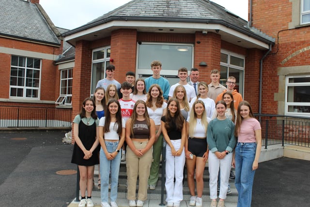 Celebrating their success are pupils who achieved 3 A Star A Grades-A2 with Mark McCullough, principal of Rainey Endowed School.