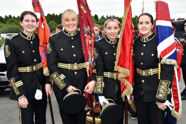 Standard bearers of Kilcluney Volunteers Flute Band, Markethill, pictured before the Mullabrack Accordion Band 40th anniversary parade on Friday night. Included are from left, Zara Johnston, Rosir Carson, Samantha Milligan and Laura Livingstone. PT22-208.