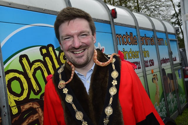 Mayor Carson lets a young snake check out his Mayoral Chain.