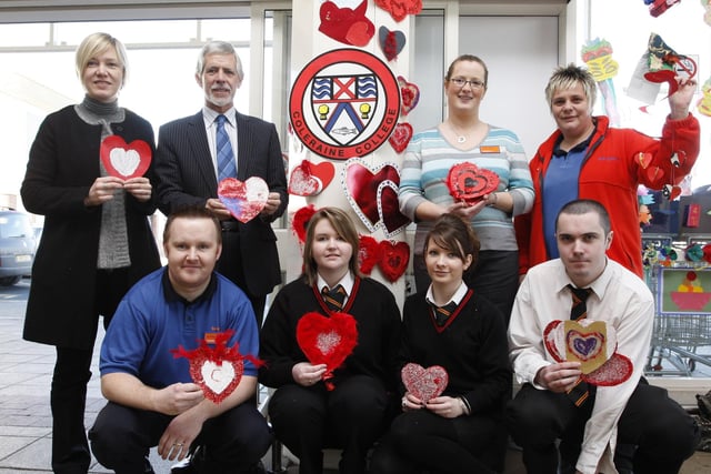 Mr. David Grainger, principal, Mrs. Alison Best, art teacher, and pupils of Coleraine College Kirsty Bell, Judith Barr and Robert Powdall pictured with the display they made at Sainsbury's for Valentine's Day. Included are staff Ian Glass, Dot McGowan, and Catriona Myers pictured back in 2008.