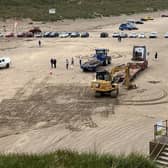 The operation to remove the beached minke whale calf from Portstewart Strand took place on Tuesday, May 27. CREDIT NI WORLD