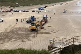 The operation to remove the beached minke whale calf from Portstewart Strand took place on Tuesday, May 27. CREDIT NI WORLD