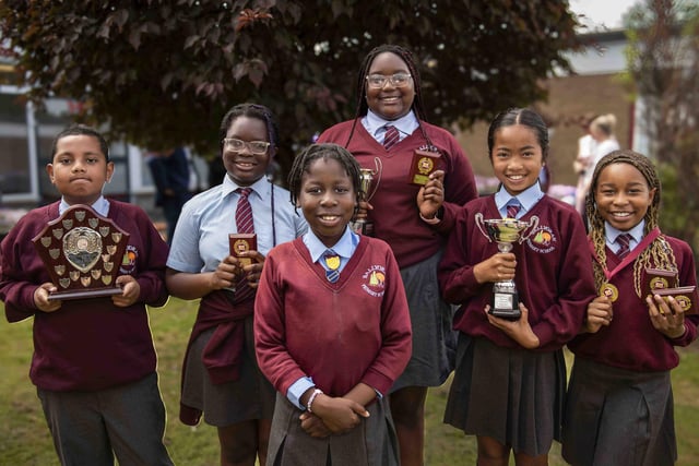 These Ballyoran PS pupils were awarded prizes for achievements in the arts, sport and positive contributions to the school. L-R Gabro Suarez Vaz, Helena Seabra, Sara Das- Neves, Lara Gomes, Dercie Guterres, Miriam Nhabele.