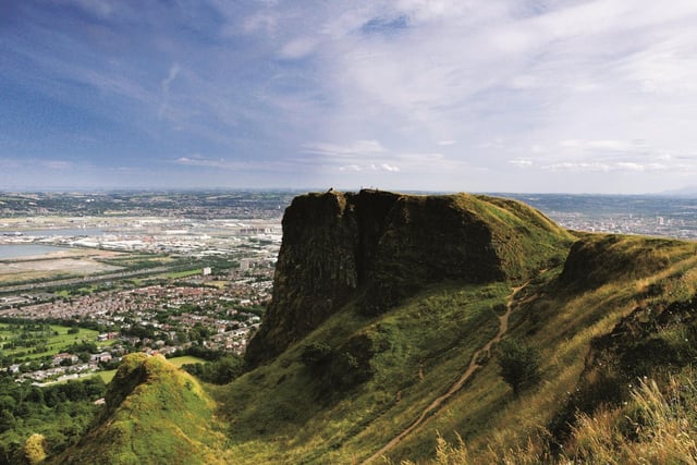 Visit Cavehill Country Park and see Belfast from a new perspective and enjoy a panoramic view of the city. 
The park has an adventure playground, archaeological sites, Cave Hill Visitor Centre, an ecotrail, gardens, orienteering routes and walking routes suitable for casual walkers and serious ramblers. 
For more information, go to visitbelfast.com/partners/cave-hill-country-park