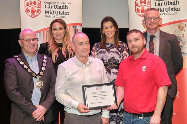 Pictured with the Chair of the Council, Councillor Dominic Molloy, Councillor Nuala McLernon, Councillor Eimear Carney and Chief Executive, Adrian McCreesh are members of staff from Environmental Services who helped achieve the NI Best Kept Awards 2023 for Magherafelt, Donaghmore & Stewartstown.