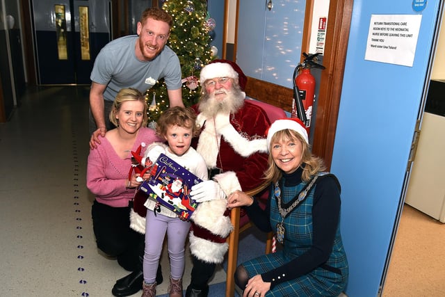 Lord Mayor of ABC Council, Alderman Margaret Tinsley pictured with Santa and the Ace family, dad, Matthew, mum,  Lindsay and Aine (3).