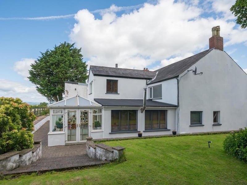 The property enjoys front and side gardens, finished in lawn, with brick pavior, decorative stone and shrubs.