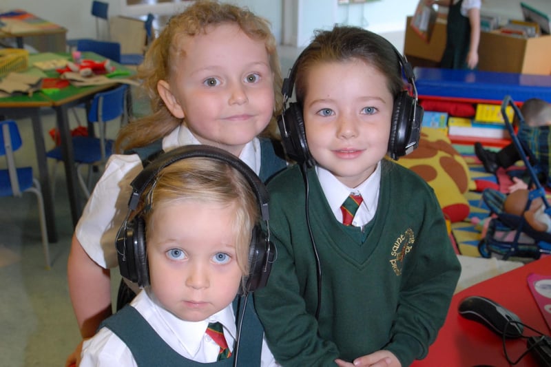 Elya, Grace and Kayley on the computer in Miss McCrory's P1 class at St MacNissi's Primary School in 2011. INLT 37-312-PR