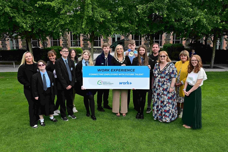 Mayor or Antrim and Newtownabbey, Councillor Leah Kirkpatrick, and Deputy Mayor Councillor Julie Gilmour, with pupils from Thornfield Special School and work placement providers, The Junction Antrim, and Starbucks.