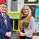 The Mayor of Mid and East Antrim, Alderman Noel Williams and Catherine Hunter, council’s environmental education officer, at one of the cigarette ballot bins.