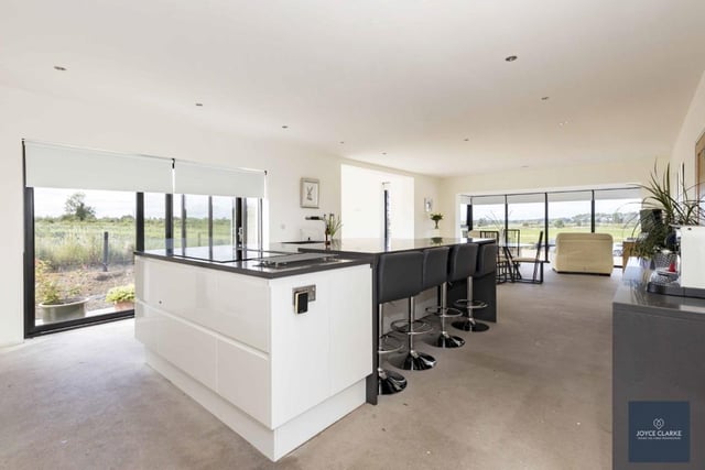 The superb open plan kitchen, dining and living area is perfect for entertaining.