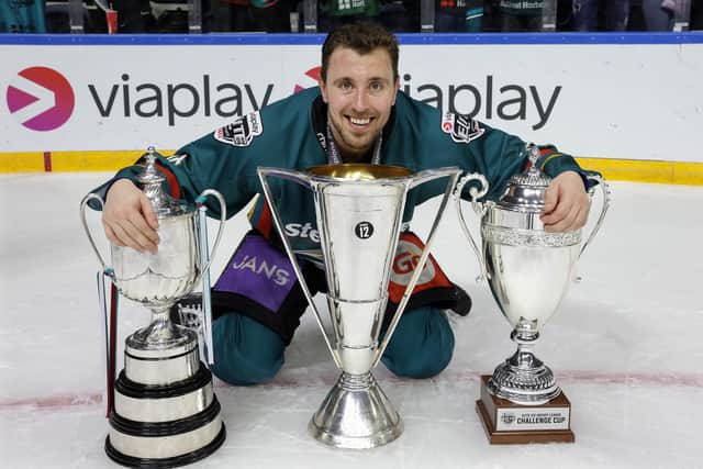 Belfast Giants’ Scott Conway celebrates completing the 'treble' after being crowned Elite Ice Hockey League Champions, Challenge Cup Champions and the EIHL Playoffs Champions at the Motorpoint Arena, Nottingham. Photo by William Cherry/Presseye