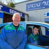 Garage Owner, Pat McCrea, Sprint Auto Centre with SERC Apprentice Daniel Scullion and 'Charlie' the car.