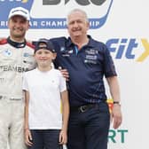 Portadown native Colin Turkington with his father Trevor and nephew Henry. Colin won 2023 British Touring Car Championship – Race 3 at Oulton Park. Picture courtesy of Jakob Ebrey Photography.