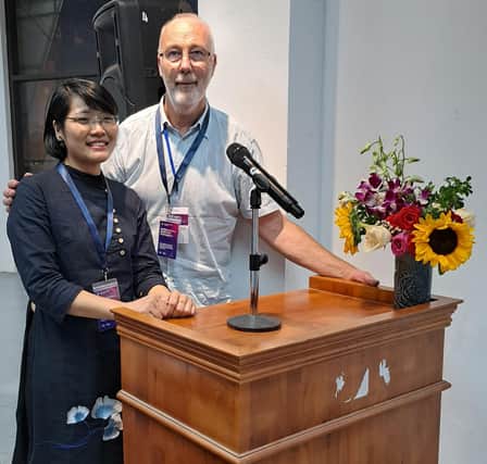 Tommy Barr with compere and translator Duyen Ngoc at the sound-check for Hanoi's International Conference.
