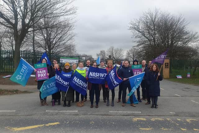 Members of the NASUWT and INTO on the picket line outside Lismore Comprehensive in Craigavon, Co Armagh during a half day strike over pay and conditions.