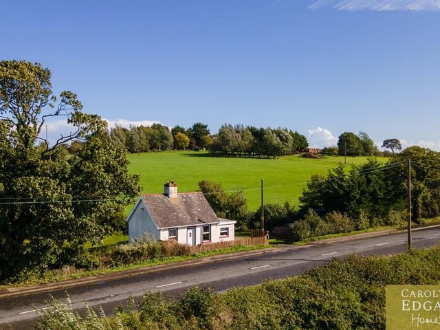 Set on a large private site of approximately 0.7 acres, surrounded by picturesque countryside and enjoying an idyllic setting, this charming former labourer's cottage dates back almost 100 years. The property is set in wraparound gardens and offers plenty of outdoor space for those looking to enjoy a more rural lifestyle with ample room for hobbies, gardening and outdoor projects. Internally, the property offers deceptively bright and spacious accommodation, with high ceilings adding to the feeling of space throughout and many of the original features. The open-plan living room features an exposed brick fireplace with woodburning stove and opens onto a well-equipped kitchen with an ample range of built in units and appliances. There are two double bedrooms, with the principal bedroom benefiting from a walk-in dressing area, and a separate bathroom.. Externally, the property sits within a large, mature site, surrounded by trees and with a generous parking area suitable for several cars. It is on the market for offers in the region of £235,000 with Carolyn Edgar Homes.