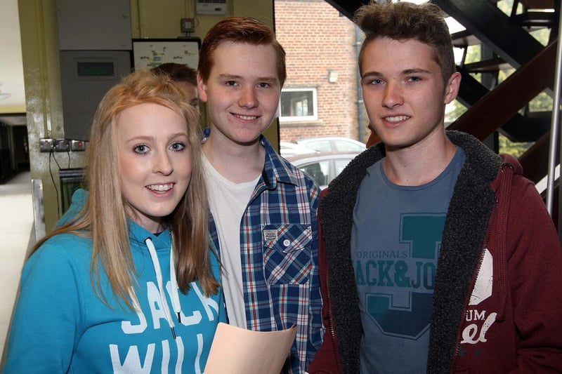Zara Lennon (7As, 2Bs and C), Storm Coates (5As, B and 2Cs) and Cameron Keys (A*, 5As, B and C) at Ballyclare High School's GCSE results day 2015.