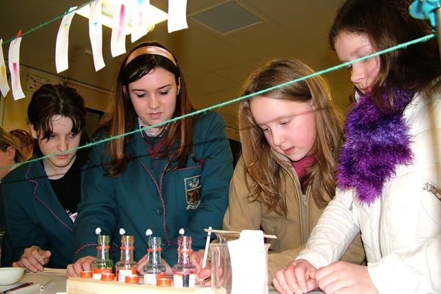 Left to right - Hunterhouse students Lauren Clarke and Victoria Dodds show Riverdale Primary School pupils Kathryn Swain and Caroline Finney some of their work in the Physics Lab during open day in 2007