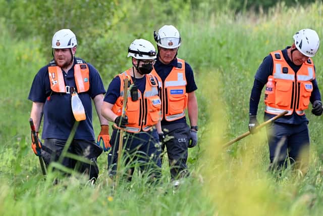 Community Search and Rescue members pictured at the Braid River in Ballymena as searches continue for  Chloe Mitchell. Picture: Stephen Hamilton/Presseye