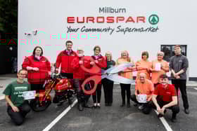 Store Manager Siobhan Honeyford, with team members from EUROSPAR Millburn Road, alongside William Callaghan from Air Ambulance Northern Ireland and volunteers from Butterfly Survivors Charity. CREDIT HENDERSON RETAIL