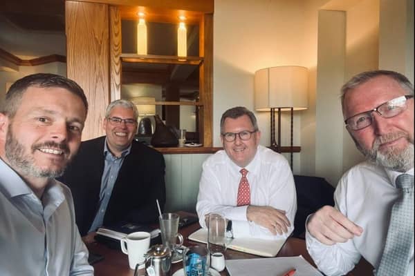 A selfie of Robbie Butler, UUP MLA, Gavin Robinson, DUP MP, Sir Jeffrey Donaldson MP, DUP leader, and UUP leader Doug Beattie MLA enjoying coffee.