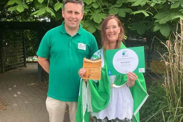Ballymoney Nursery School’s Norah McCarron received the Eco-Teacher of the Year award  from Gareth Lamrock, Field Officer, Keep NI Beautiful. Credit Christopher Walsh