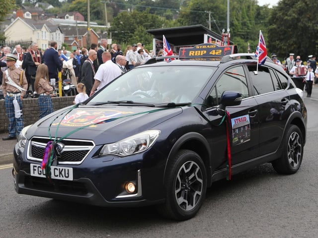 Taking part in the 'Last Saturday' parade.