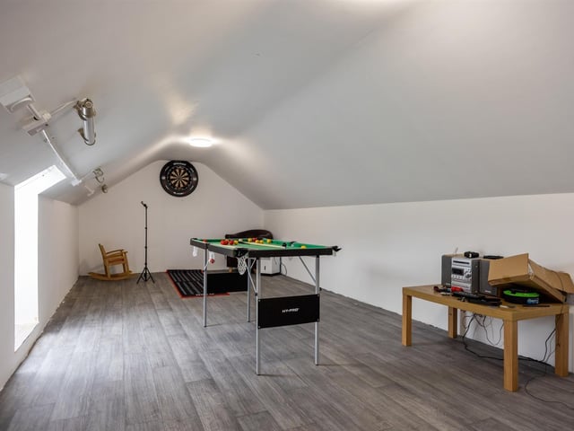 Floored roof area of garage.
