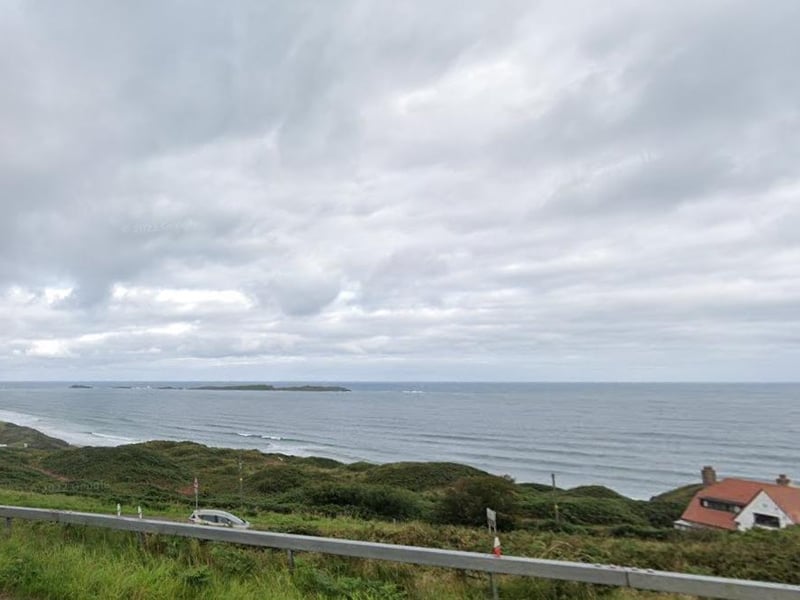 There is nothing like that first glimpse of home - and anyone who comes from Portrush will tell you that the best way to return is down the 'Ballybogey line'. Driving from Ballymoney to Portrush, just before you arrive at the Royal Court Hotel which overlooks the White Rocks, the car will curve around two bends in the road and - wow - there it is! The mighty north Atlantic, the Skerries, Royal Portrush Golf Course, the peninsula town and the White Rocks beach - all revealed to you in an instant....and you're home. The view is nothing short of spectacular and I never grow tired of it.
