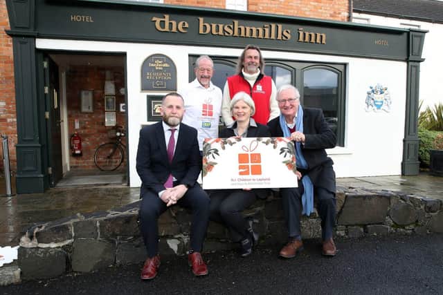 Pictured l-r Alan Walls, General Manager of The Bushmills Inn; Raymond Pollock and Willie Gregg, members of the Northern Ireland Children to Lapland and Days to Remember Trust (NICLT) North Coast fundraising committee; Nikki Picken, Sales and Marketing Manager, The Bushmills Inn; and Colin Barkley, Chair NICLT. Credit NICLT