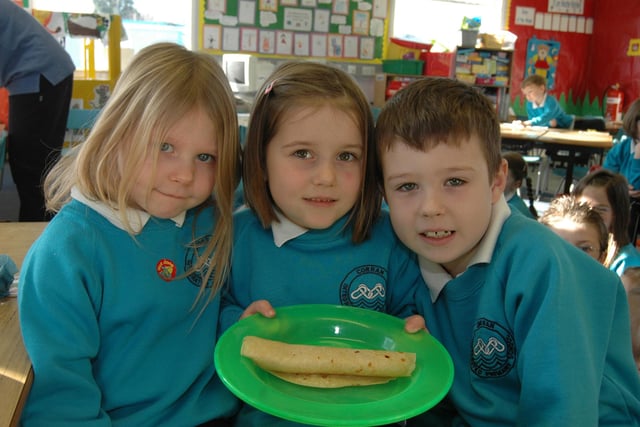 India, Poppy and Jordan share a big pancake at Corran Integrated Primary School in 2007.